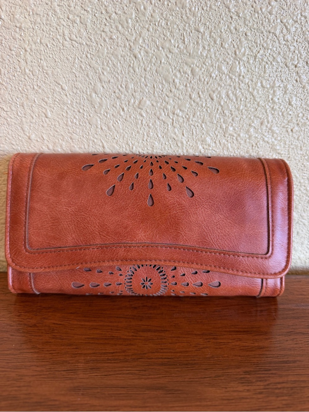 Women's Tan Leather Clutch with Cutout Floral Detailing